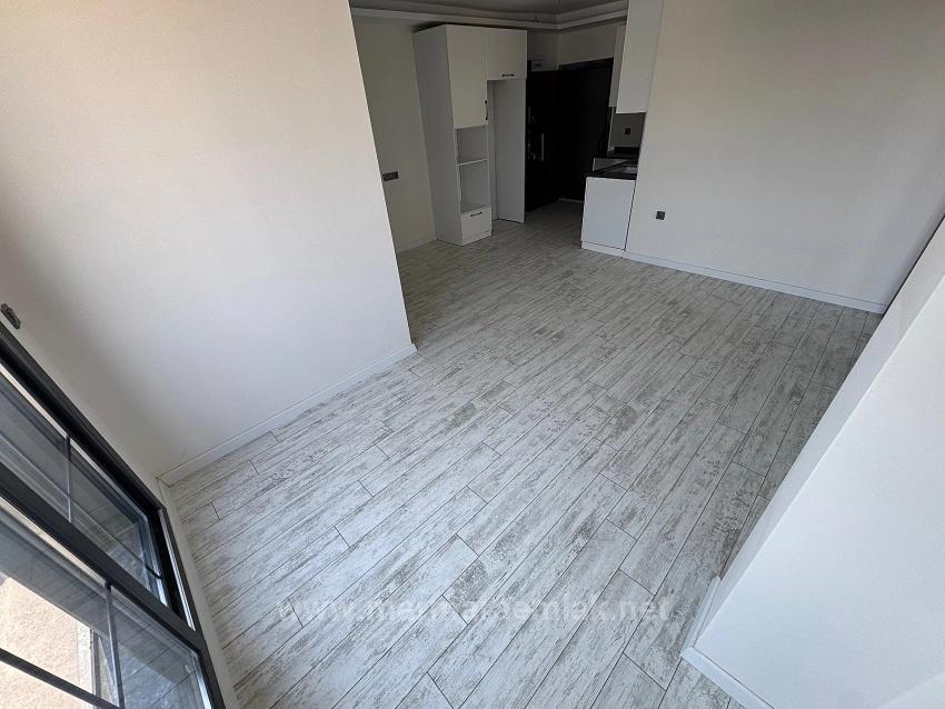1+1-Zimmer-Wohnung Im Mittleren Stockwerk Zum Verkauf In Seferihisar Doğanbey, 60 Meter Vom Meer Entfernt.