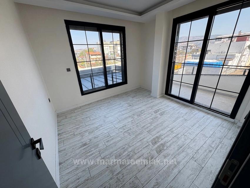 1+1-Zimmer-Wohnung Im Mittleren Stockwerk Zum Verkauf In Seferihisar Doğanbey, 60 Meter Vom Meer Entfernt.