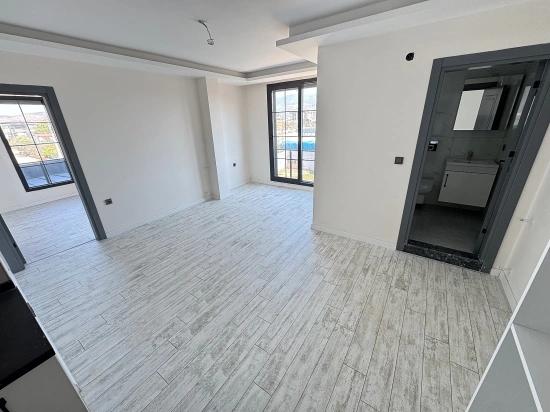 1+1-Zimmer-Wohnung Im Mittleren Stockwerk Zum Verkauf In Seferihisar Doğanbey, 60 Meter Vom Meer Entfernt.