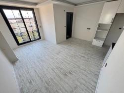 1+1-Zimmer-Wohnung Im Mittleren Stockwerk Zum Verkauf In Seferihisar Doğanbey, 60 Meter Vom Meer Entfernt.