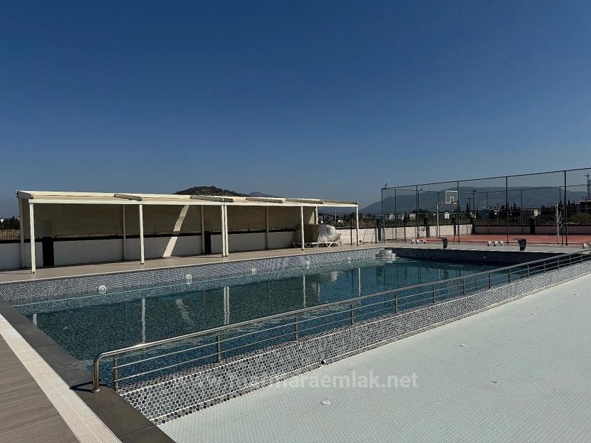 1+1 Apartment For Sale In A Complex With A Pool In Doğanbey, Seferihisar