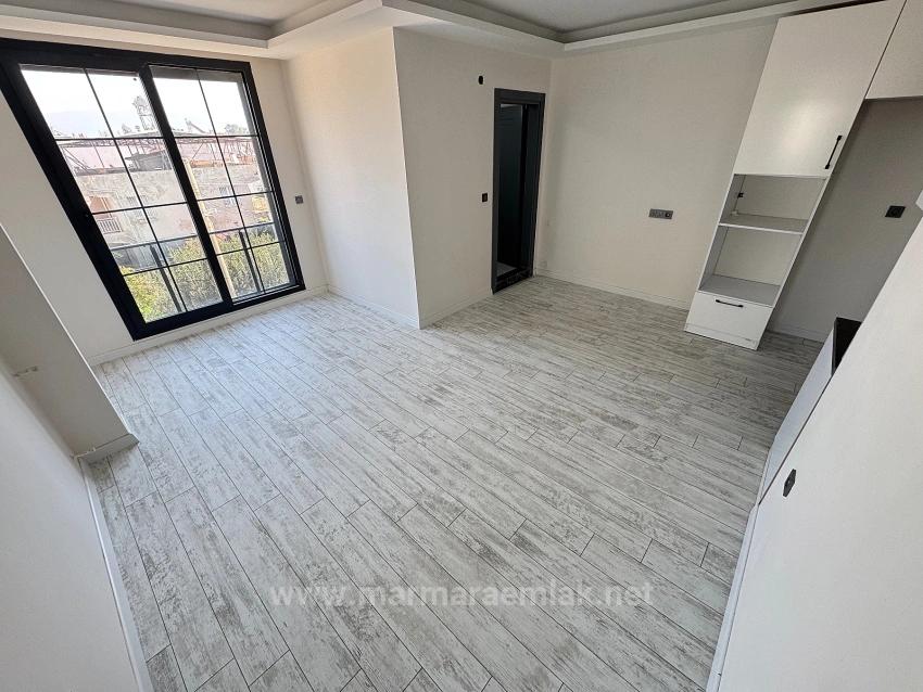 1+1 Mid-Floor Apartment For Sale In Doğanbey, Seferihisar, 60 Meters From The Sea.