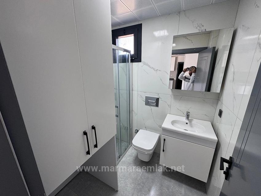 1+1 Mid-Floor Apartment For Sale In Doğanbey, Seferihisar, 60 Meters From The Sea.