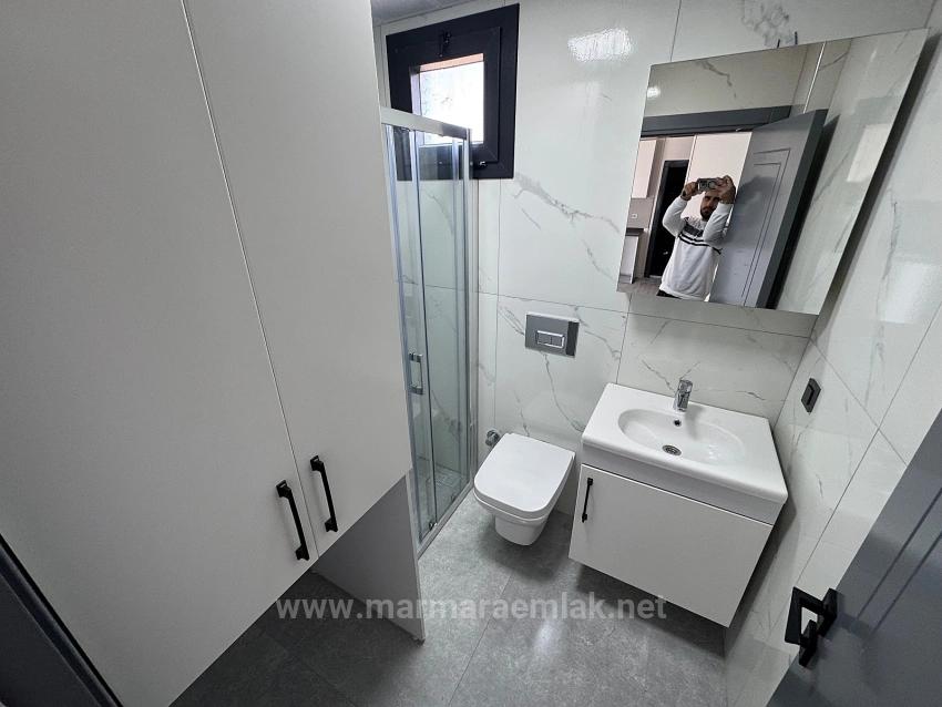 1+1 Mid-Floor Apartment For Sale In Doğanbey, Seferihisar, 60 Meters From The Sea.