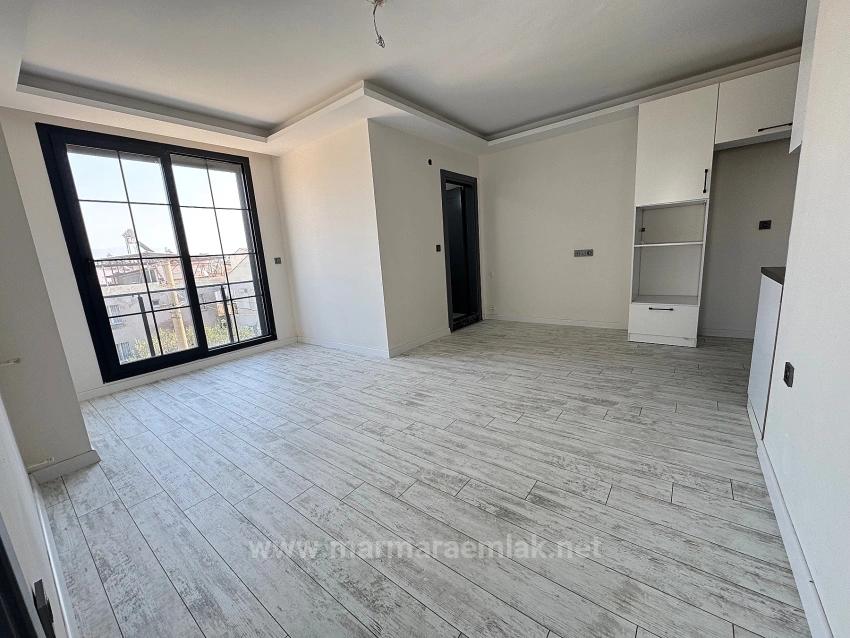 1+1 Mid-Floor Apartment For Sale In Doğanbey, Seferihisar, 60 Meters From The Sea.
