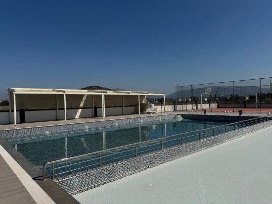 1+1 Apartment For Sale In A Complex With A Pool In Doğanbey, Seferihisar