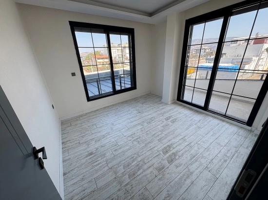 1+1 Mid-floor Apartment For Sale In Doğanbey, Seferihisar, 60 Meters From The Sea.
