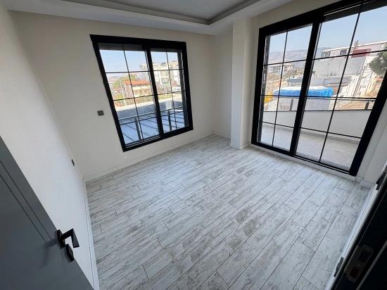 1+1 Mid-floor Apartment For Sale In Doğanbey, Seferihisar, 60 Meters From The Sea.