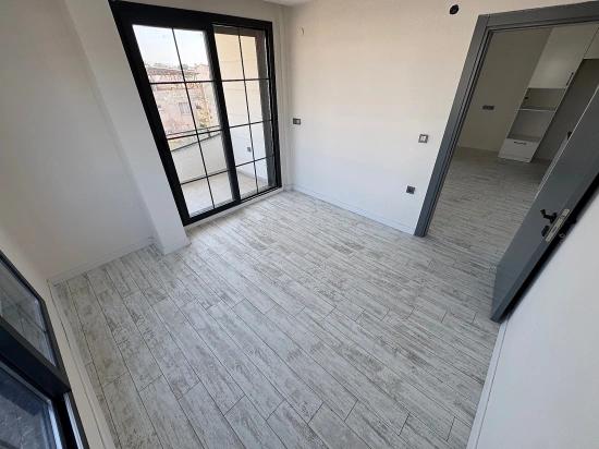 1+1 Mid-floor Apartment For Sale In Doğanbey, Seferihisar, 60 Meters From The Sea.