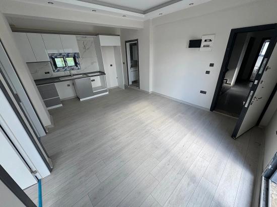 Menderes Gümüldür De Satılık 2+1 Bahçeli Daire